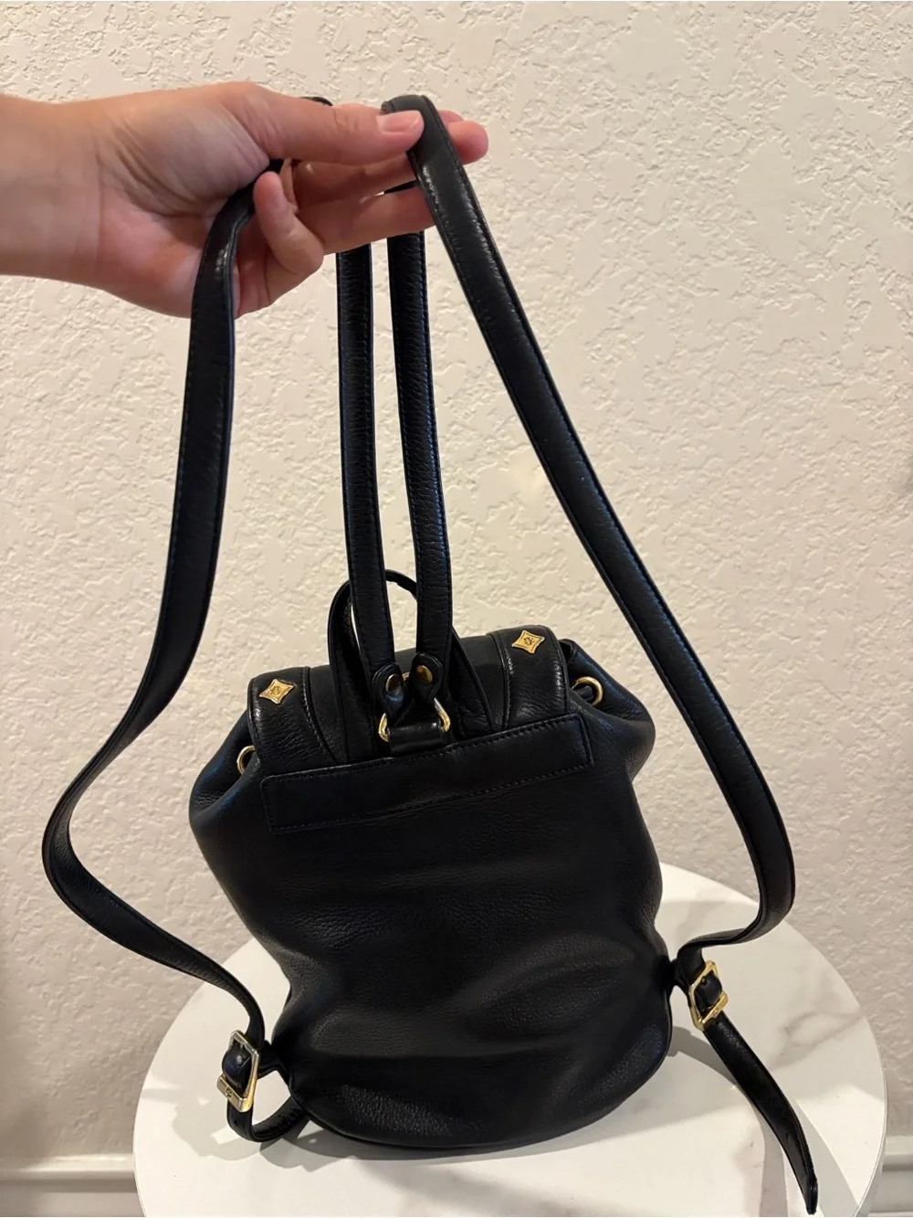 MCM Black Leather Drawstring Backpack with Gold Hardware